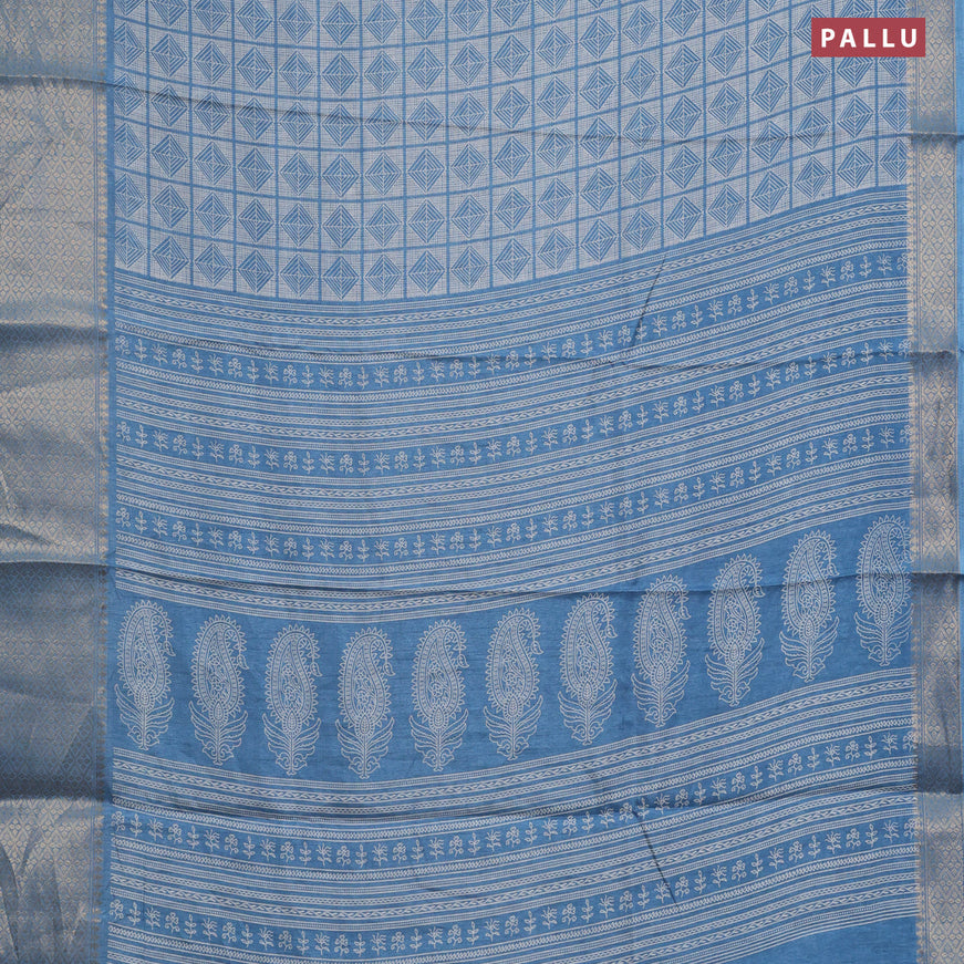 Semi dola saree blue shade with allover geometric prints and zari woven border