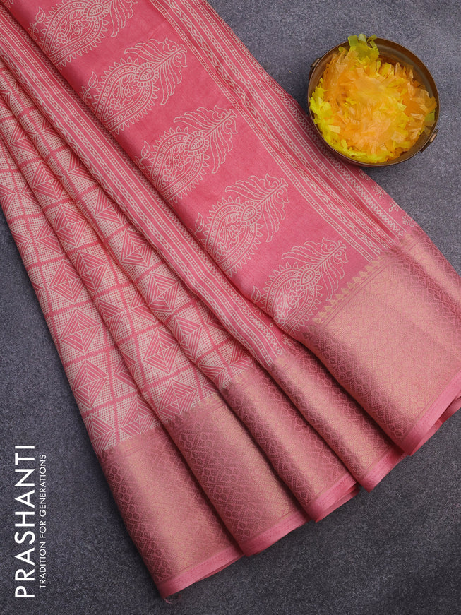 Semi dola saree peach pink with allover geometric prints and zari woven border