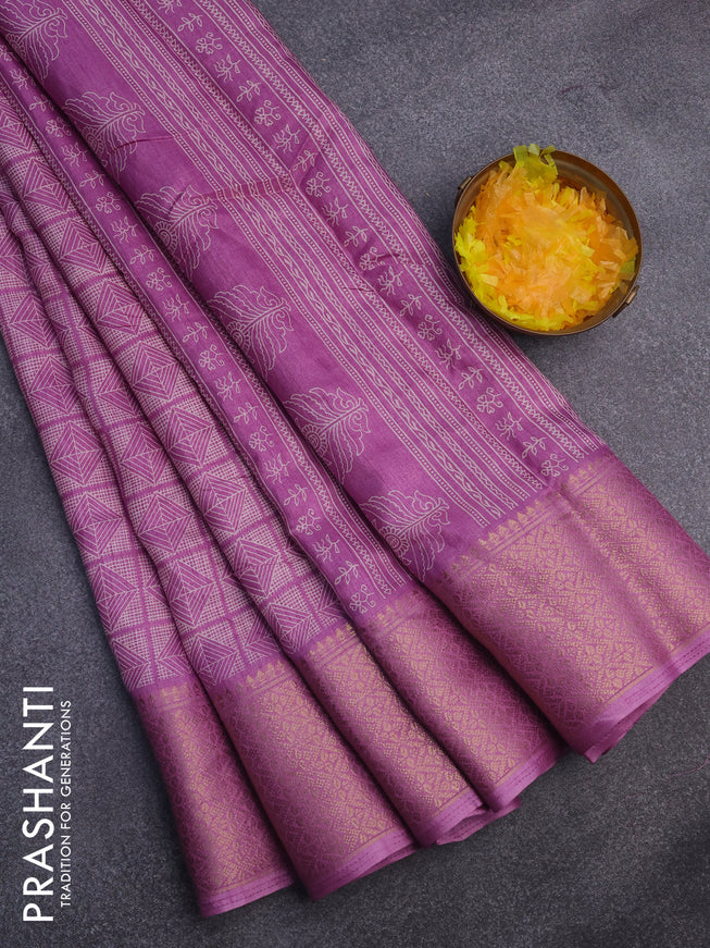 Semi dola saree purple shade with allover geometric prints and zari woven border