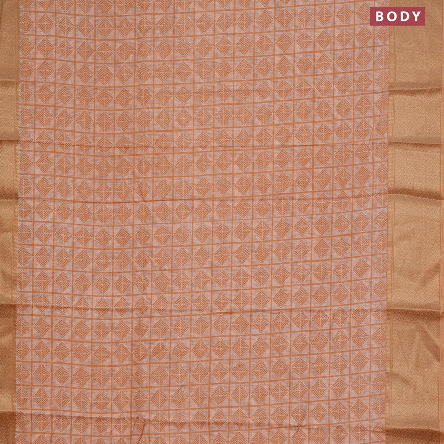 Semi dola saree peach orange with allover geometric prints and zari woven border