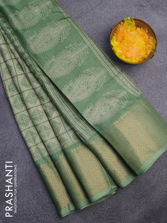 Semi dola saree pastel green with allover geometric prints and zari woven border