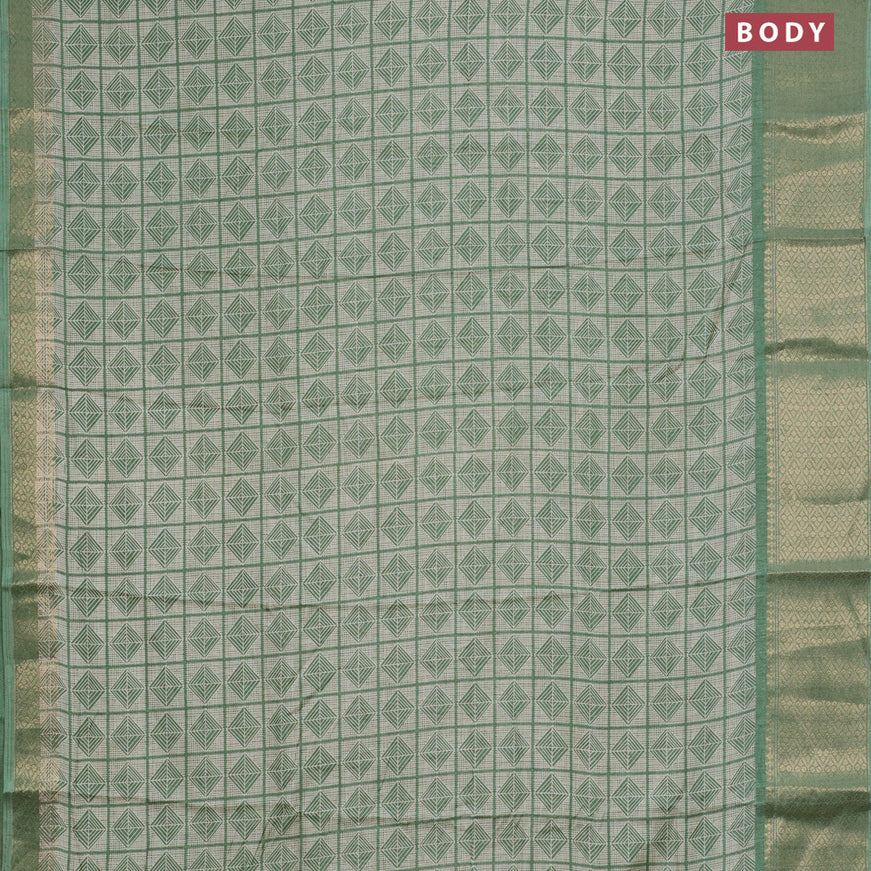 Semi dola saree pastel green with allover geometric prints and zari woven border