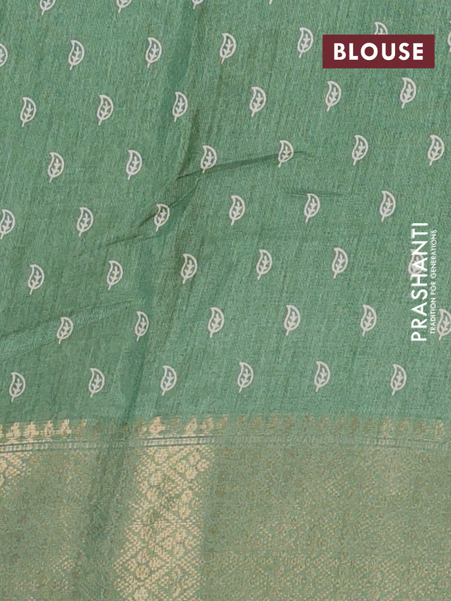 Semi dola saree pastel green with allover geometric prints and zari woven border