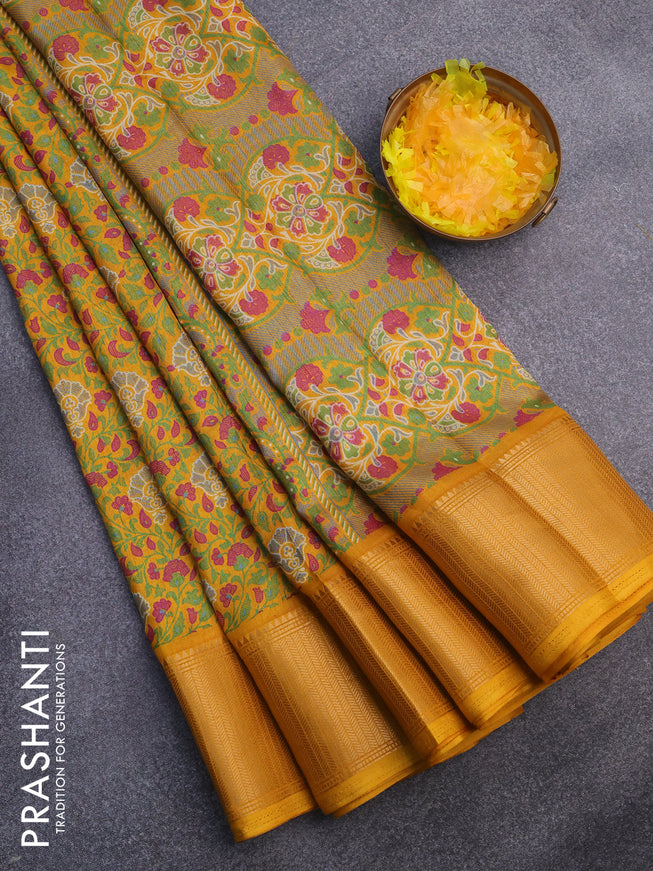 Semi dola saree mustard shade with allover floral prints and zari woven border