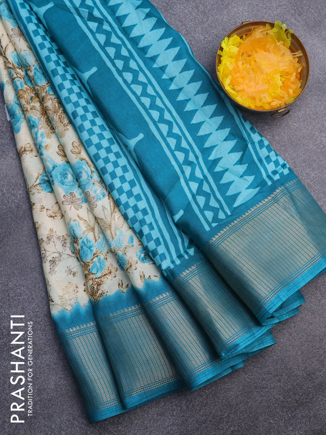 Semi dola saree cream and teal blue with allover floral prints and zari woven border