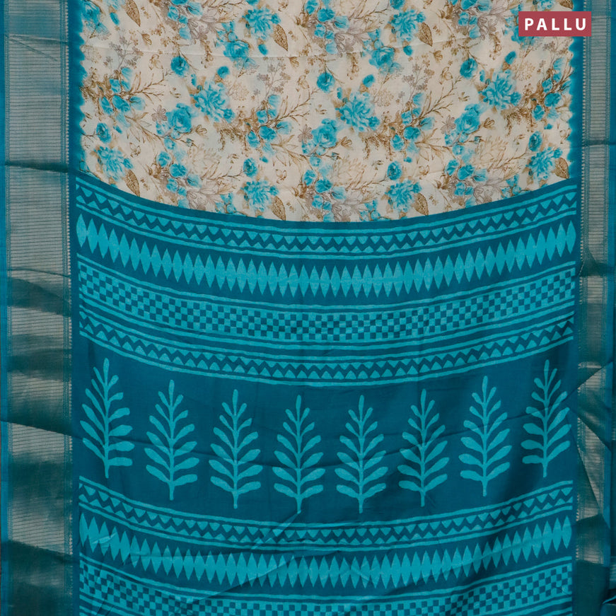 Semi dola saree cream and teal blue with allover floral prints and zari woven border