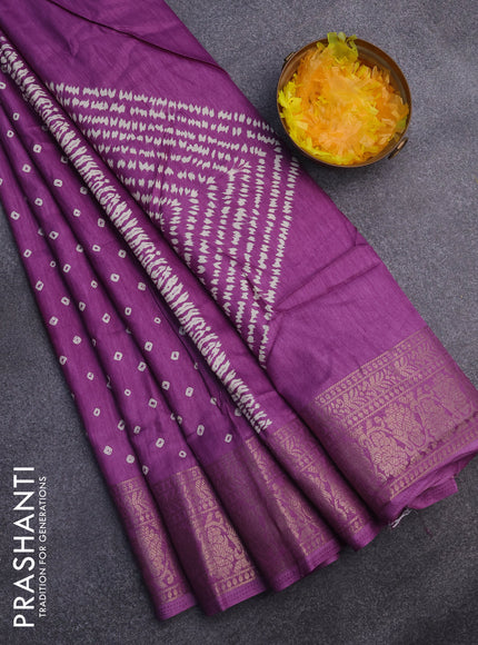 Semi dola saree purple shade with allover bandhani butta prints and zari woven border