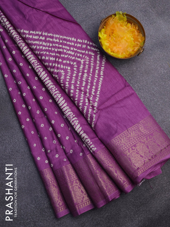 Semi dola saree purple shade with allover bandhani butta prints and zari woven border