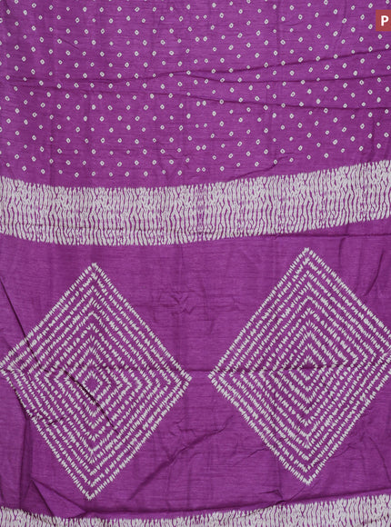 Semi dola saree purple shade with allover bandhani butta prints and zari woven border