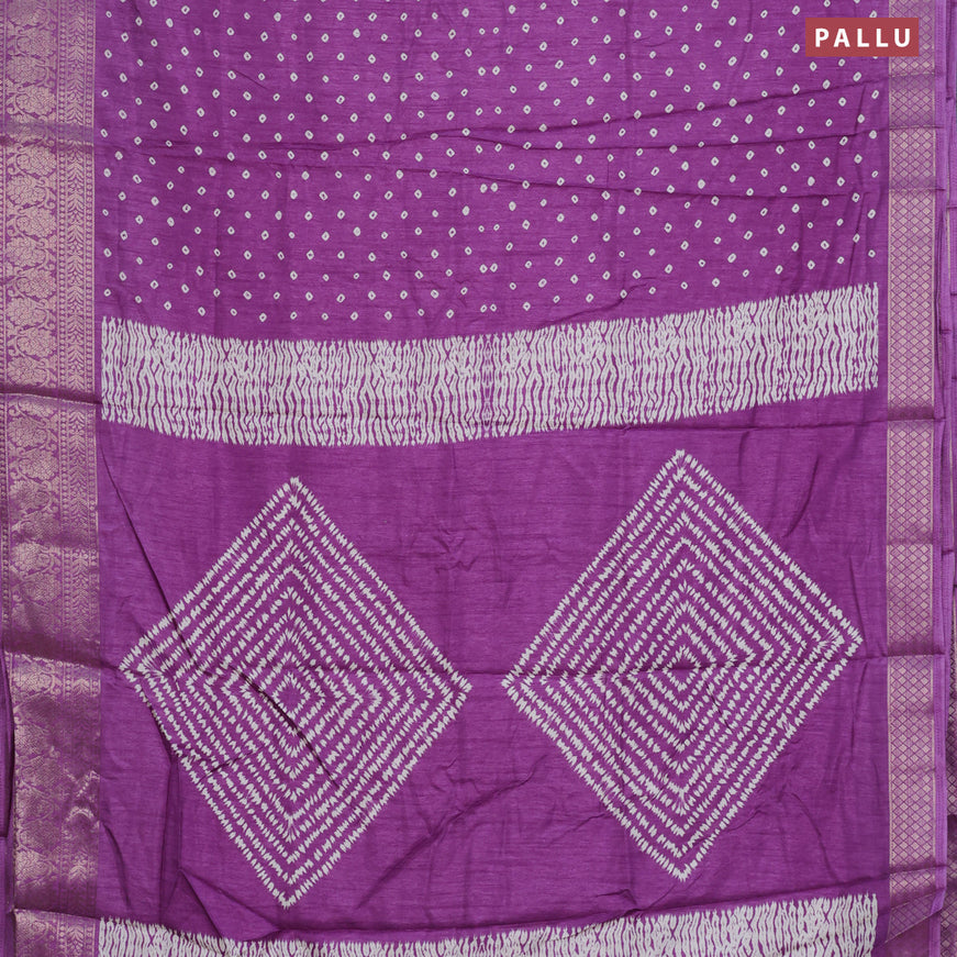 Semi dola saree purple shade with allover bandhani butta prints and zari woven border