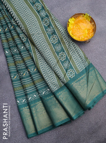 Semi dola saree green with allover prints and zari woven border