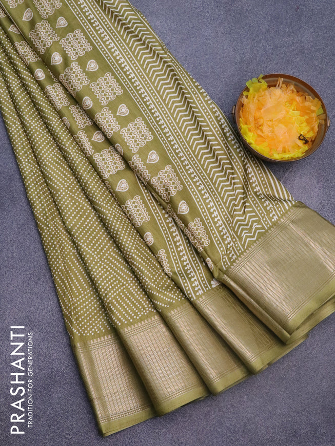 Semi dola saree mehendi green with allover bandhani prints and zari woven border