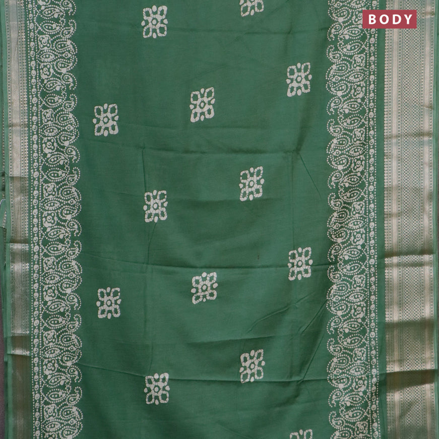 Semi dola saree green with batik butta prints and zari woven border