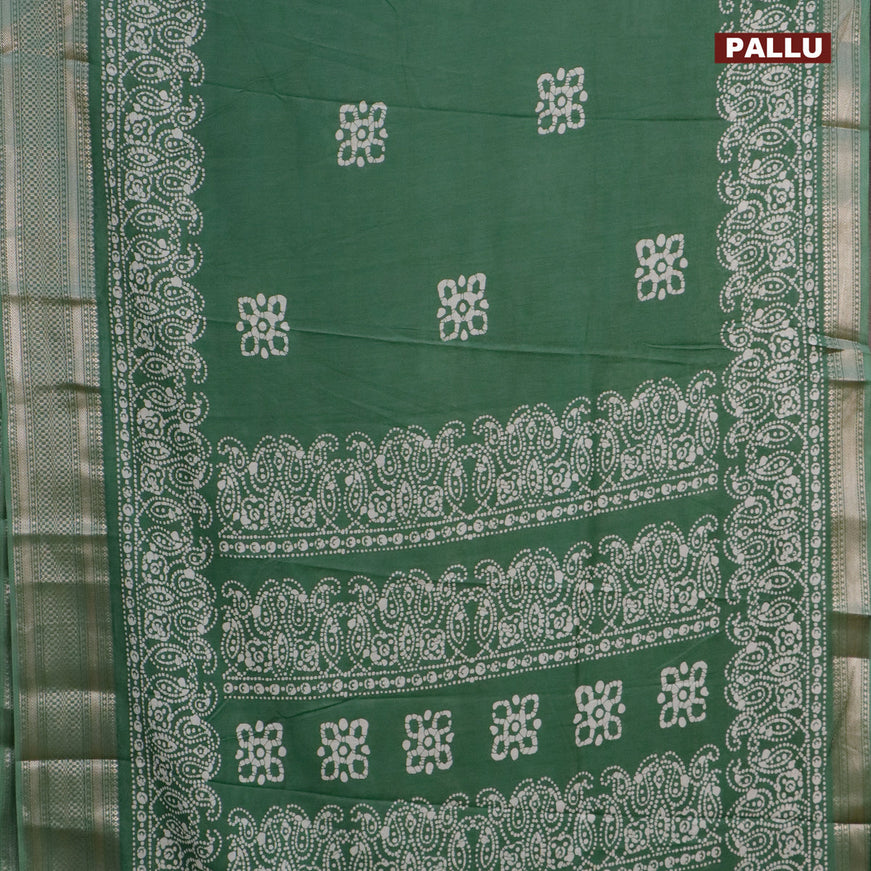 Semi dola saree green with batik butta prints and zari woven border