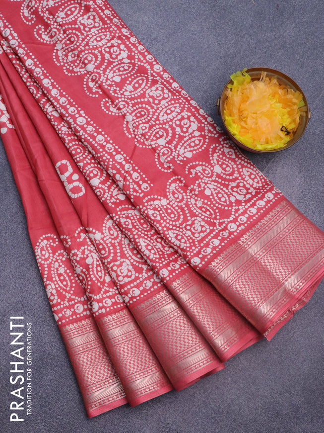 Semi dola saree red shade with batik butta prints and zari woven border