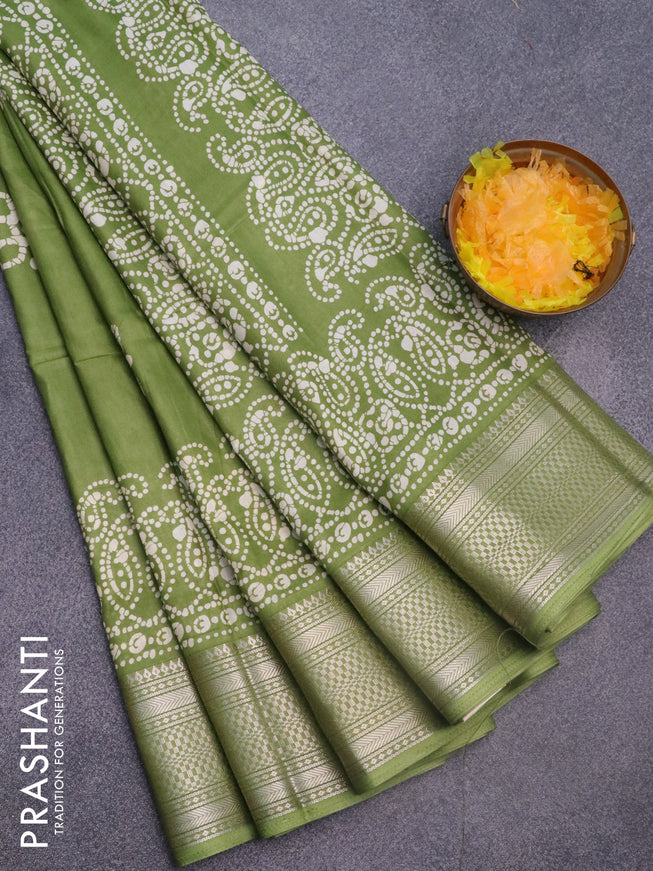 Semi dola saree light green with batik butta prints and zari woven border