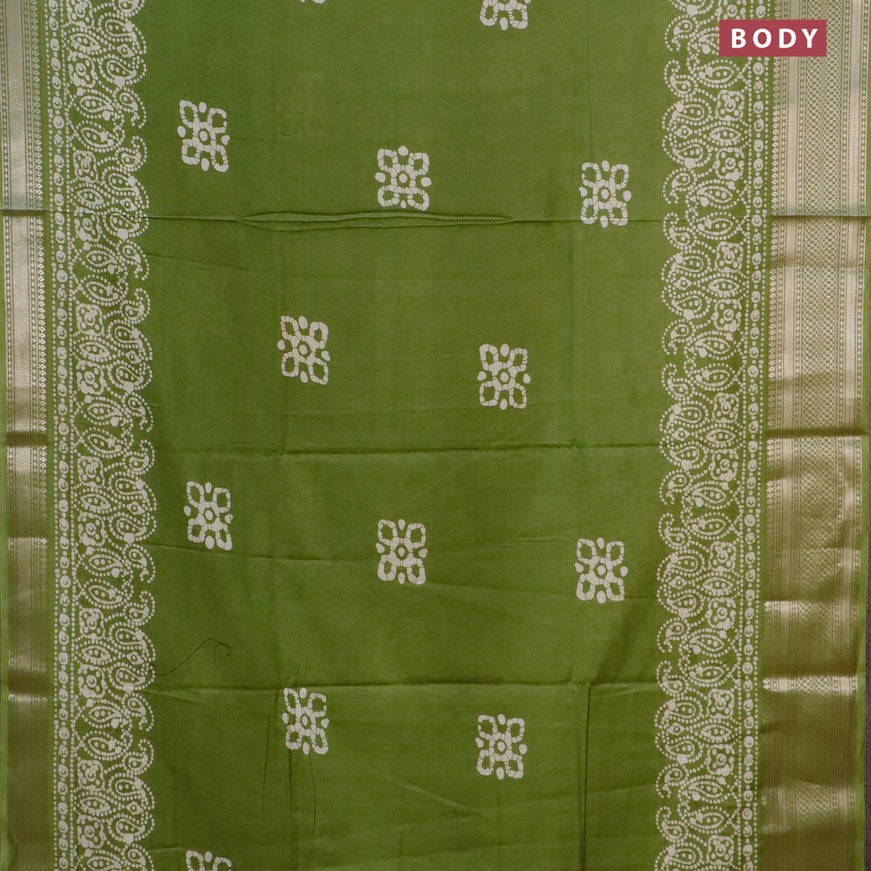 Semi dola saree light green with batik butta prints and zari woven border