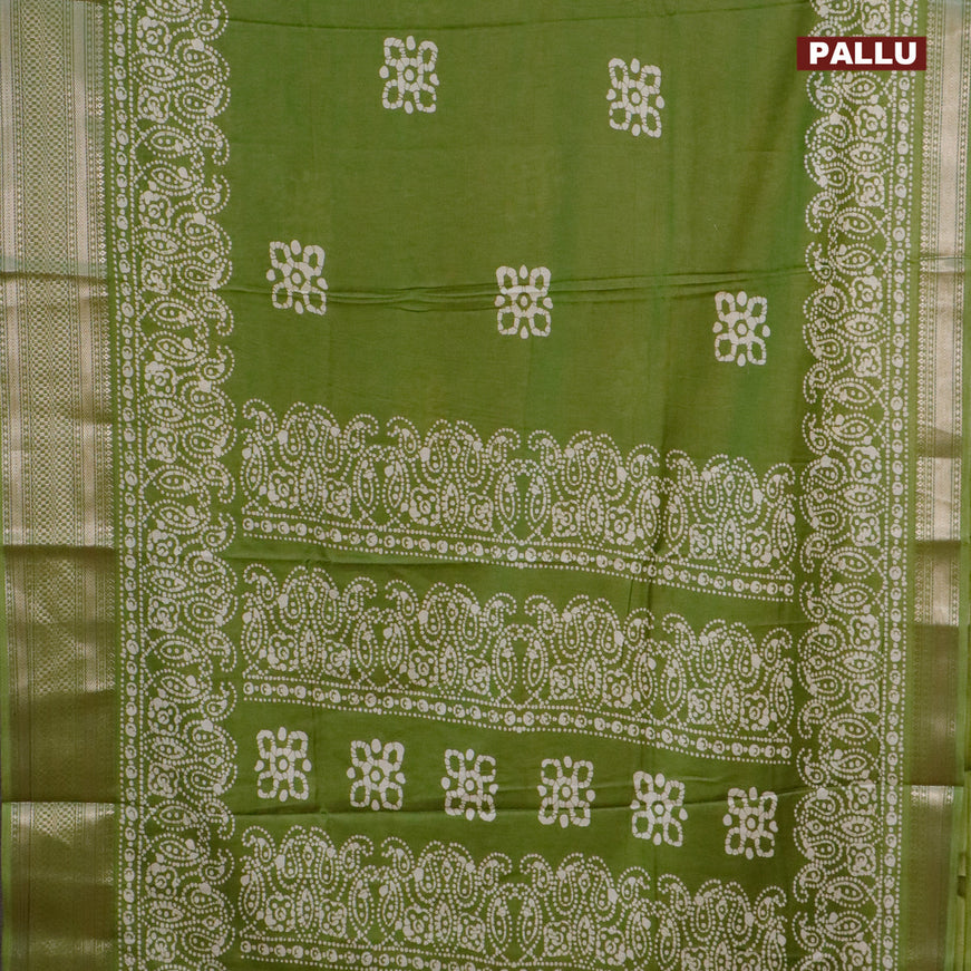 Semi dola saree light green with batik butta prints and zari woven border