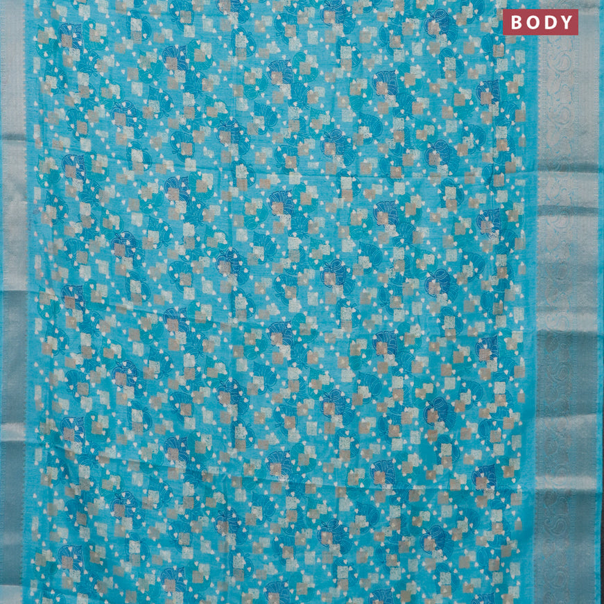 Semi dola saree light blue with allover prints and zari woven border