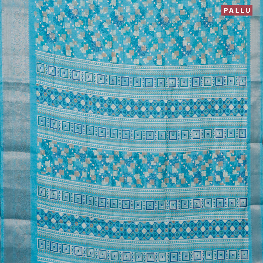 Semi dola saree light blue with allover prints and zari woven border