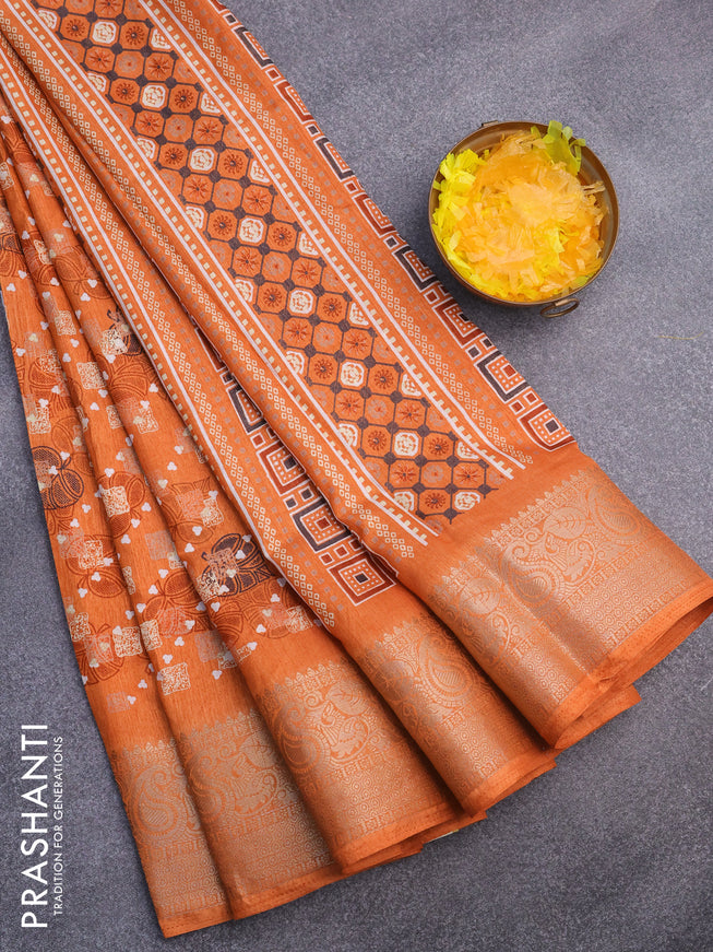 Semi dola saree orange with allover prints and zari woven border