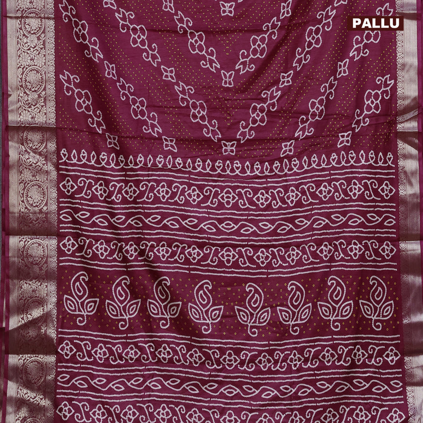 Semi dola saree purple with allover bandhani prints and zari woven border