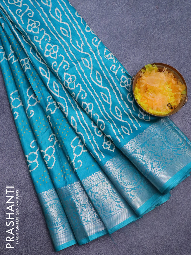 Semi dola saree teal blue with allover bandhani prints and zari woven border