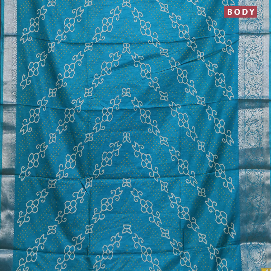 Semi dola saree teal blue with allover bandhani prints and zari woven border