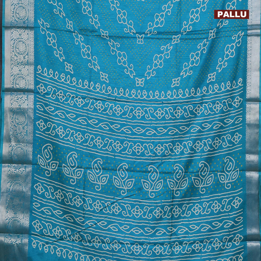 Semi dola saree teal blue with allover bandhani prints and zari woven border