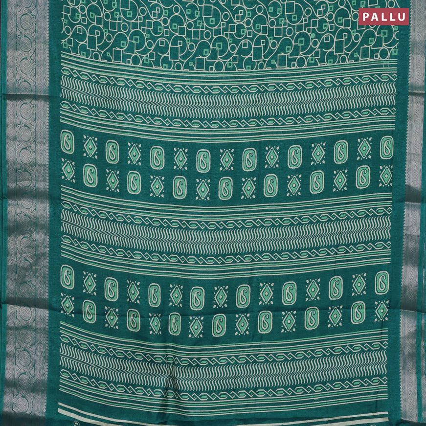 Semi dola saree teal blue with allover geometric prints and zari woven border