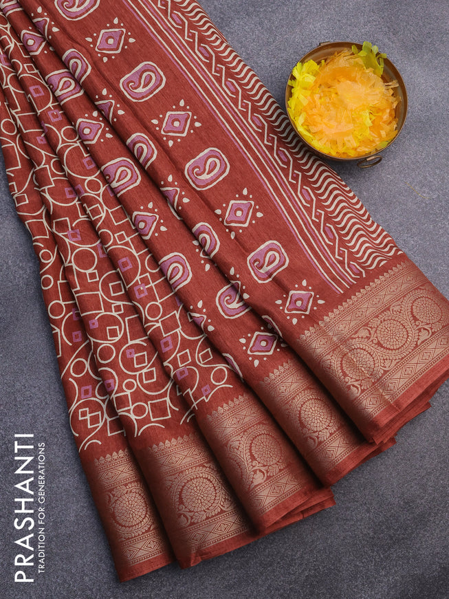 Semi dola saree rust shade with allover geometric prints and zari woven border