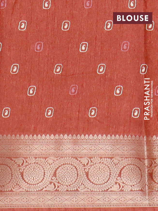 Semi dola saree rust shade with allover geometric prints and zari woven border