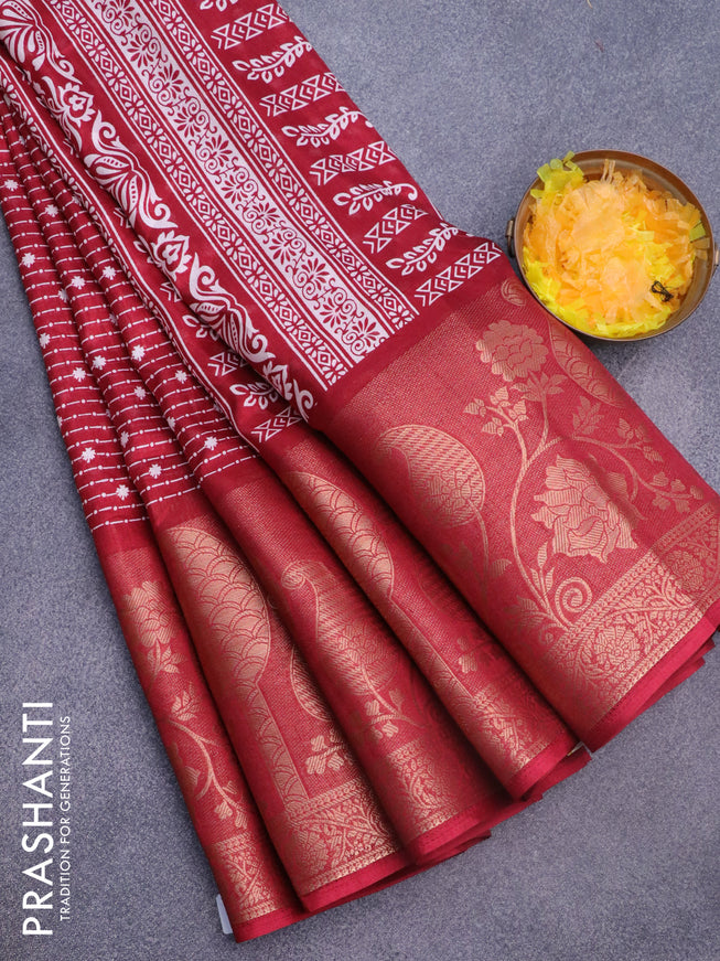 Semi dola saree maroon with allover prints and long rich zari woven border