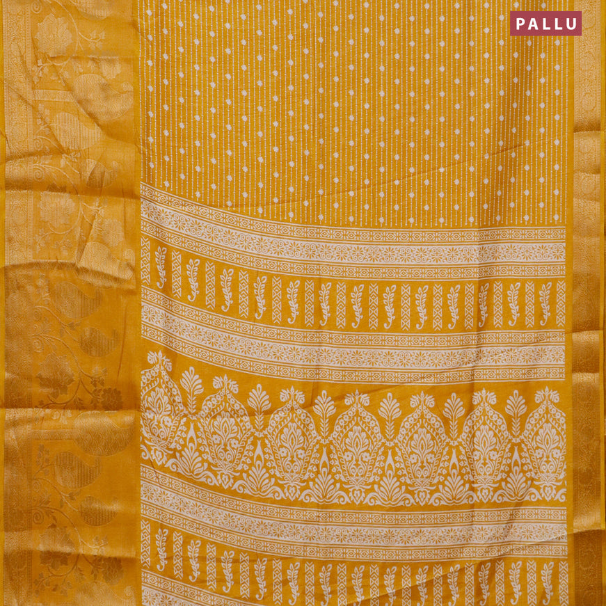 Semi dola saree mustard yellow with allover prints and long rich zari woven border