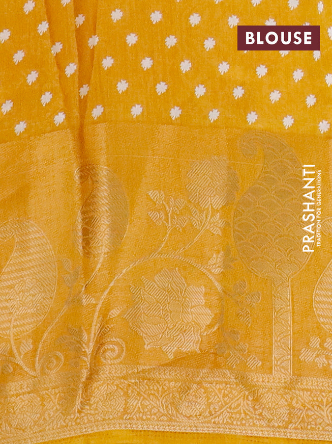 Semi dola saree mustard yellow with allover prints and long rich zari woven border