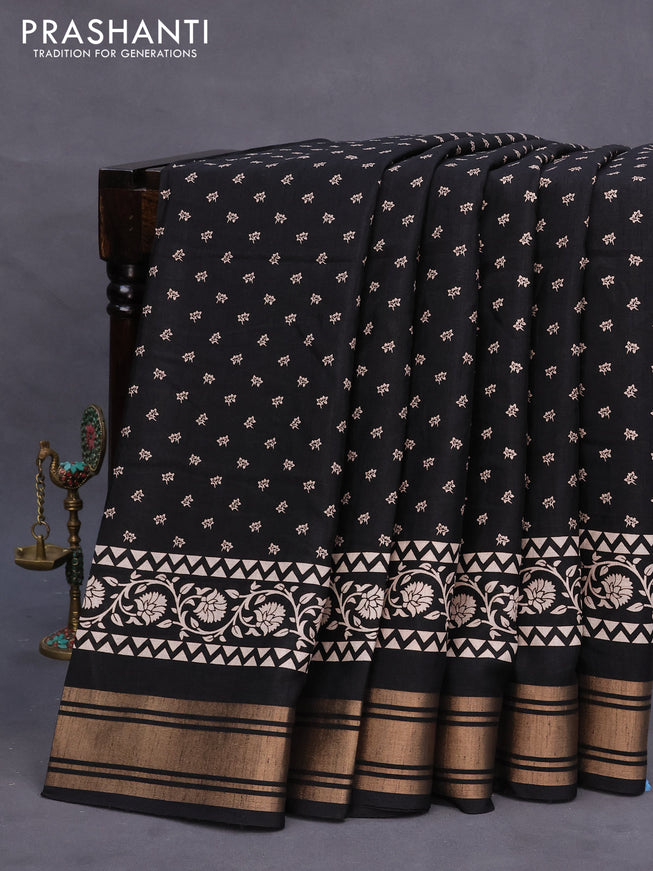 Semi matka tussar saree black with allover floral butta prints and zari woven border