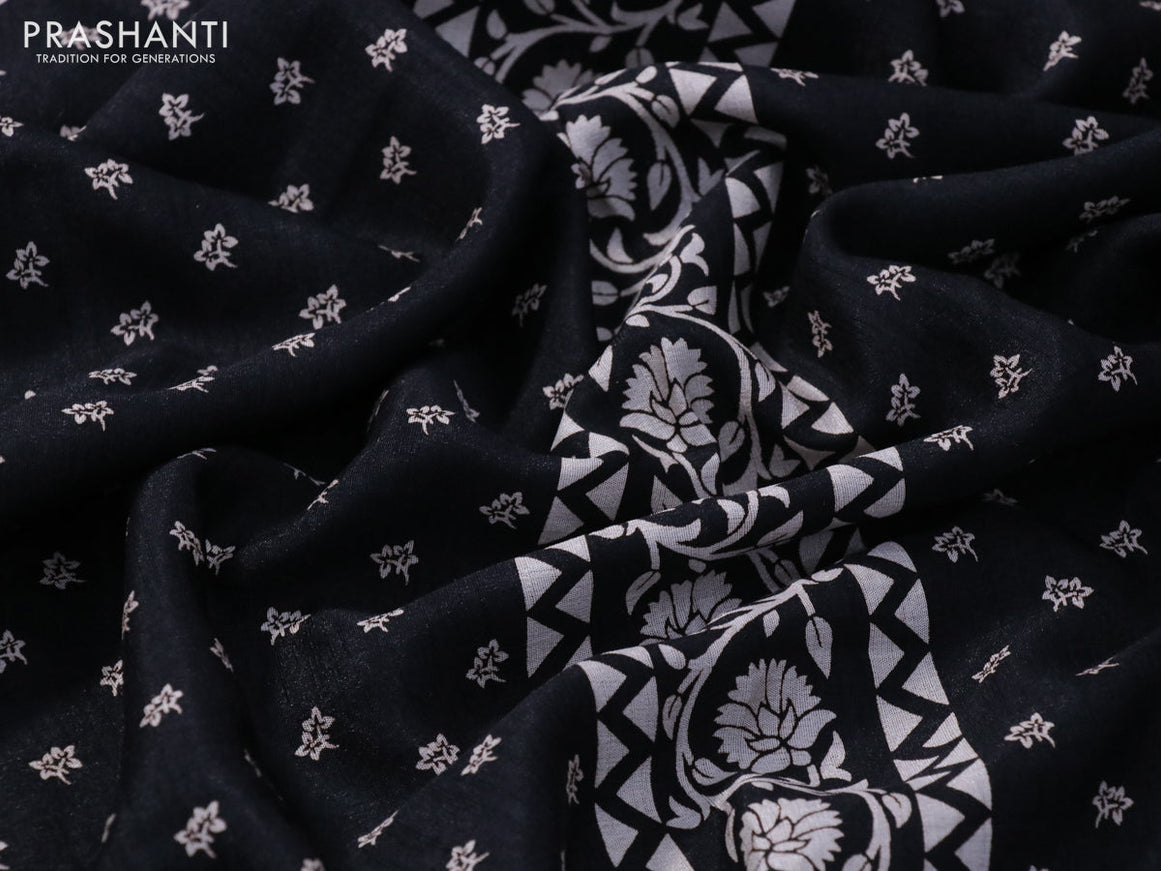 Semi matka tussar saree black with allover floral butta prints and zari woven border