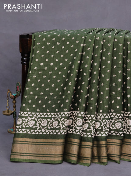 Semi matka tussar saree sap green with allover floral butta prints and zari woven border