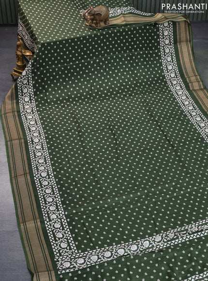 Semi matka tussar saree sap green with allover floral butta prints and zari woven border