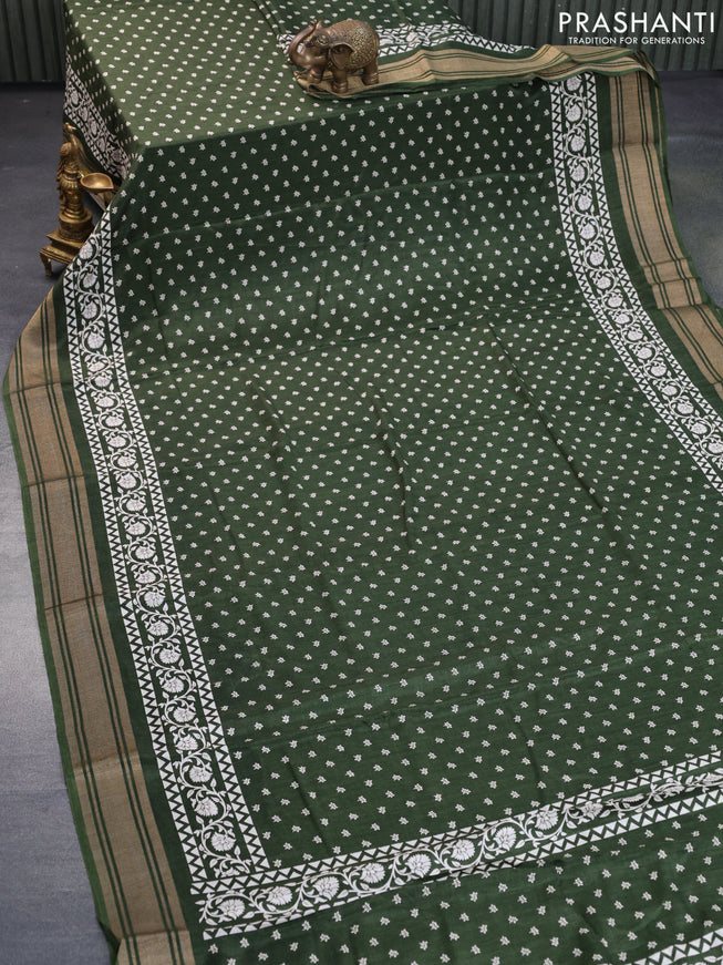 Semi matka tussar saree sap green with allover floral butta prints and zari woven border