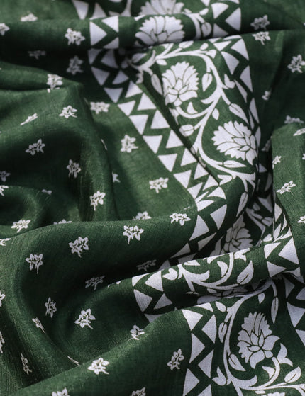 Semi matka tussar saree sap green with allover floral butta prints and zari woven border