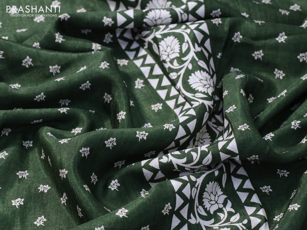 Semi matka tussar saree sap green with allover floral butta prints and zari woven border