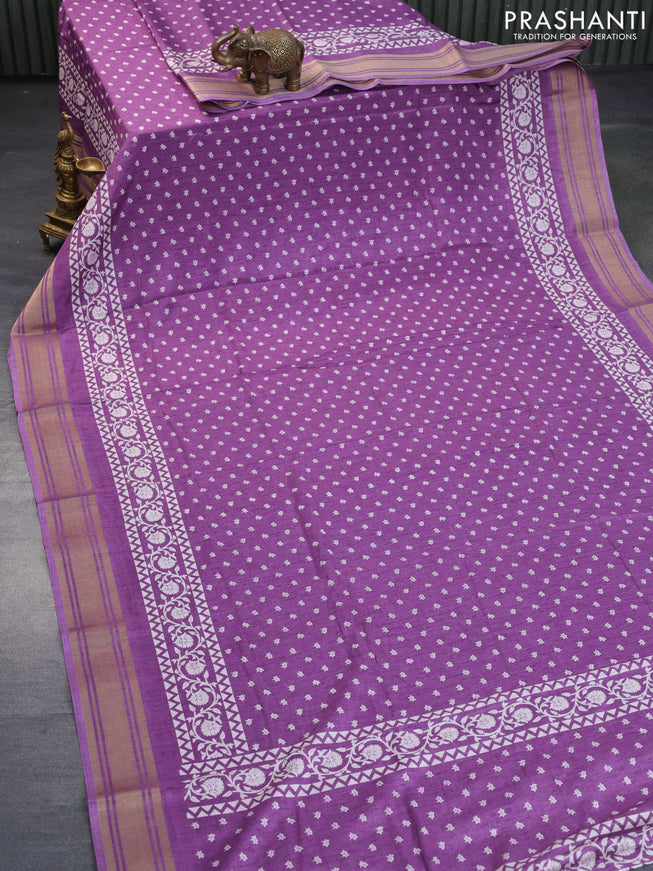 Semi matka tussar saree lavender shade with allover floral butta prints and zari woven border