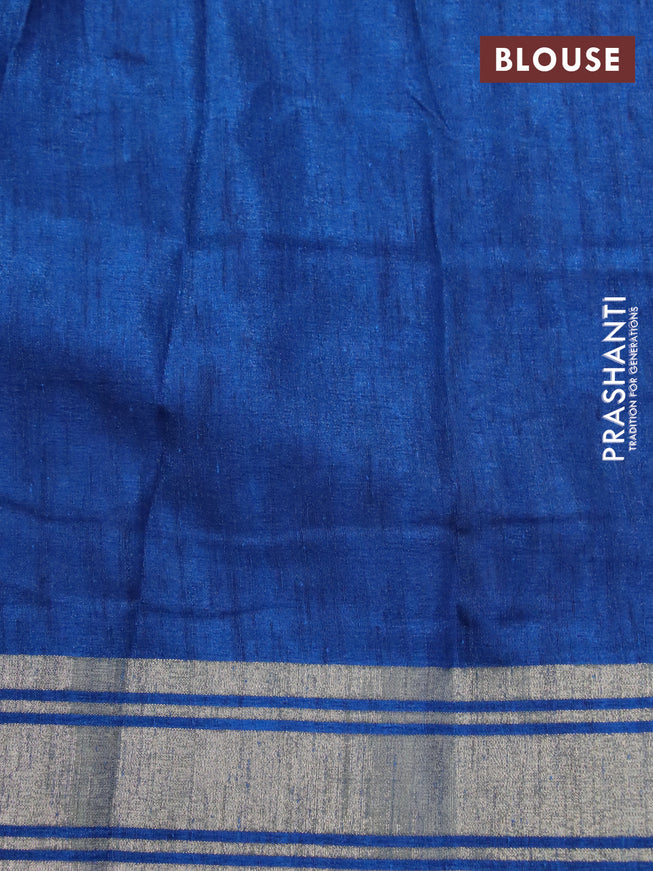 Semi matka tussar saree peacock blue with allover floral butta prints and zari woven border