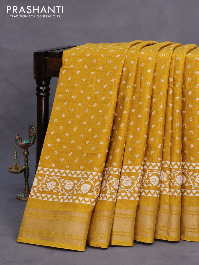 Semi matka tussar saree dark mustard shade with allover floral butta prints and zari woven border