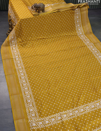 Semi matka tussar saree dark mustard shade with allover floral butta prints and zari woven border