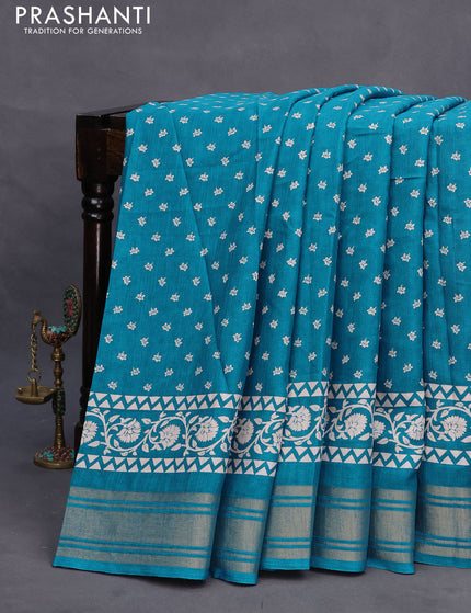 Semi matka tussar saree teal blue with allover floral butta prints and zari woven border