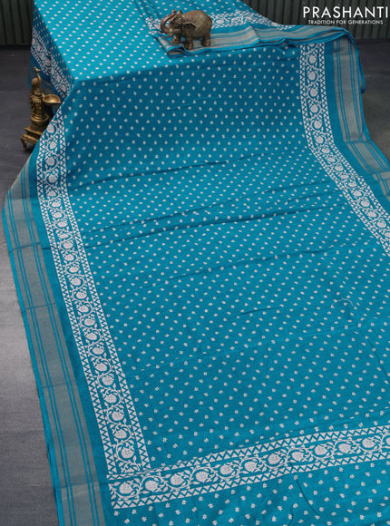 Semi matka tussar saree teal blue with allover floral butta prints and zari woven border