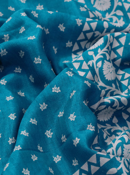 Semi matka tussar saree teal blue with allover floral butta prints and zari woven border