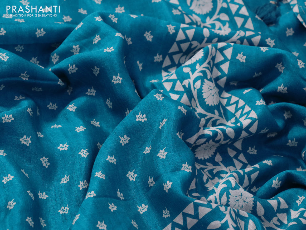 Semi matka tussar saree teal blue with allover floral butta prints and zari woven border